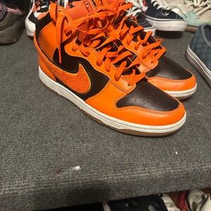 Nike Bold Orange and Black High-Tops